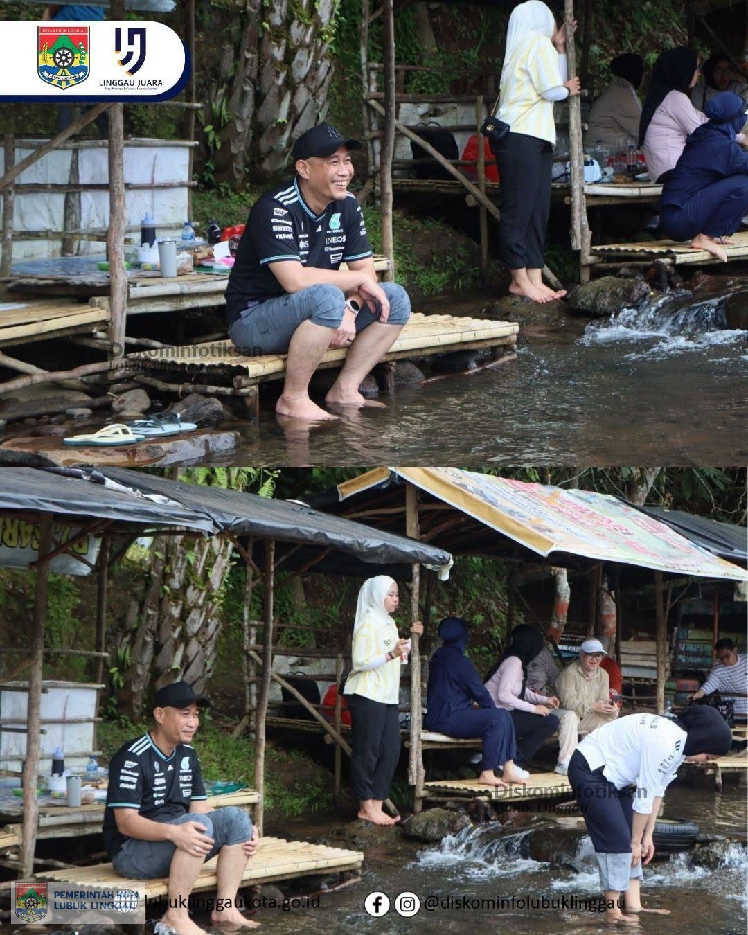 Wali Kota Lubuk Linggau, H Rachmat Hidayat bersama Ketua TP PKK Kota Lubuk Linggau, Hj Risca Priba Ayu mengunjungi warga di kawasan wisata Batu Pepe, Sungai Malus, Kelurahan Petanang, Minggu (21/6/2026). 
